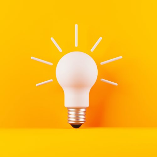 Light bulb on yellow background. Horizontal composition with copy space. Creativity and innovation concept.